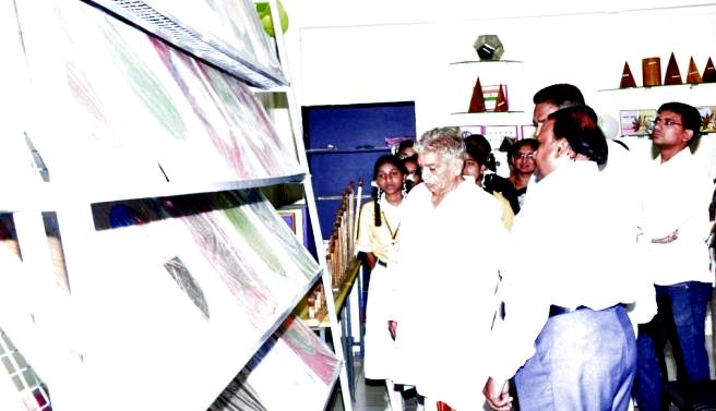 Visitors exploring a Maths Lab installation